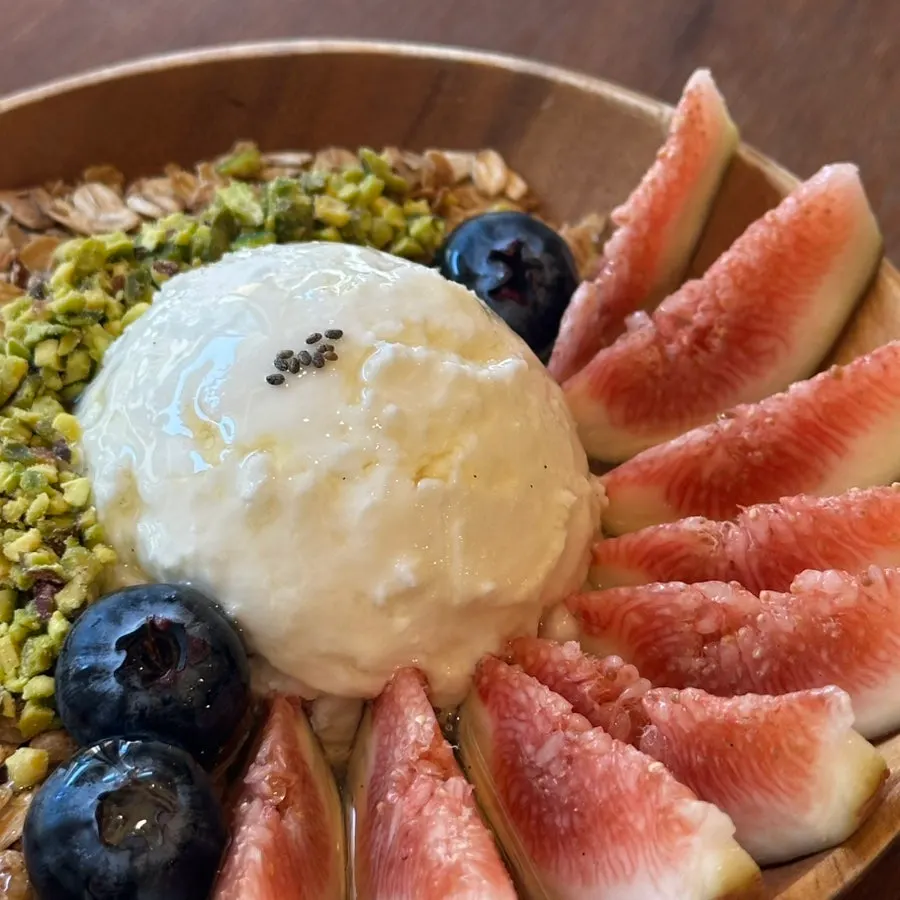 Generous scoop of Greek yogurt in the center of the bowl