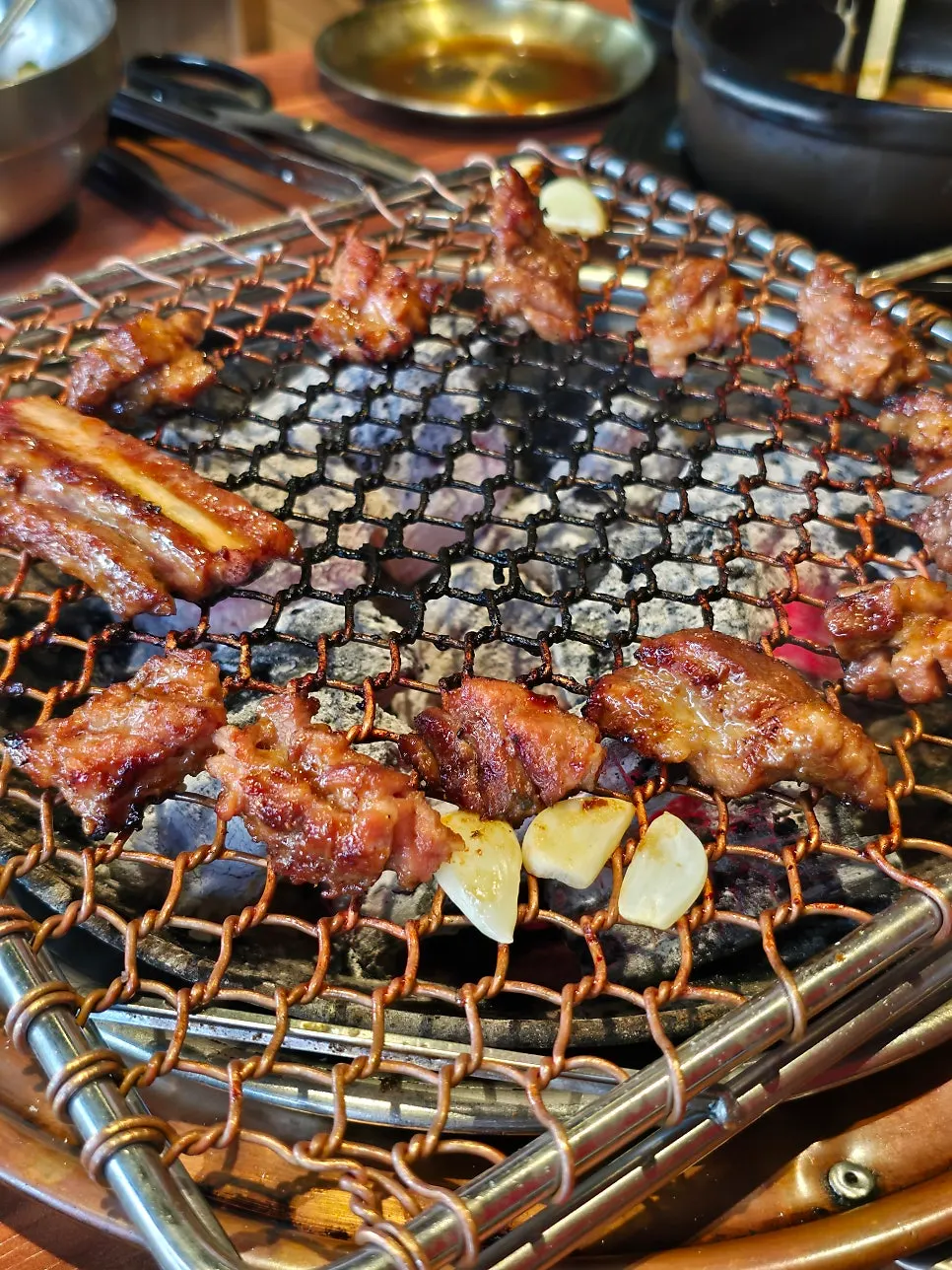 A piece of marinated ribs caramelized on the charcoal