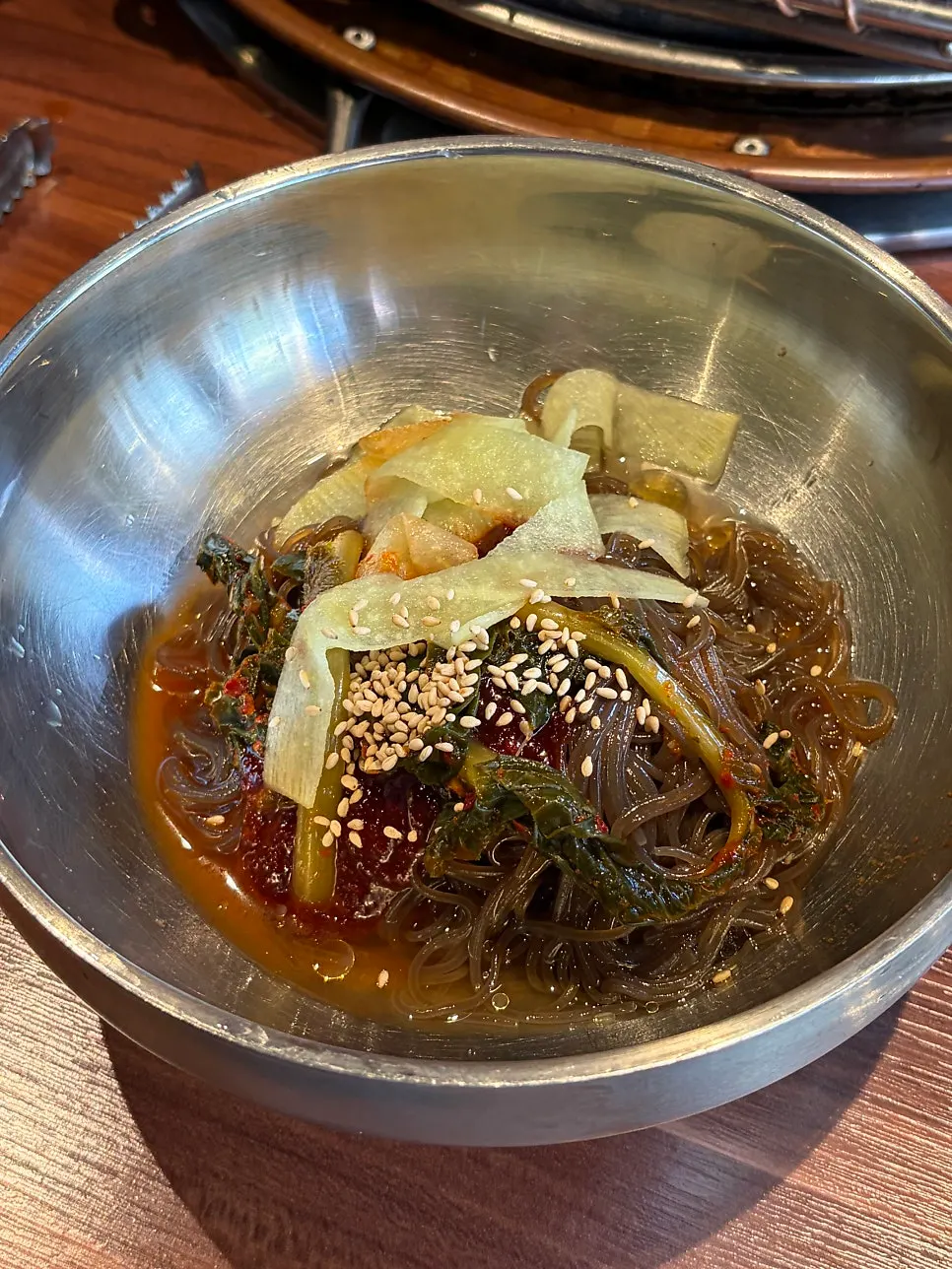 A bowl of dessert spicy mixed cold noodles
