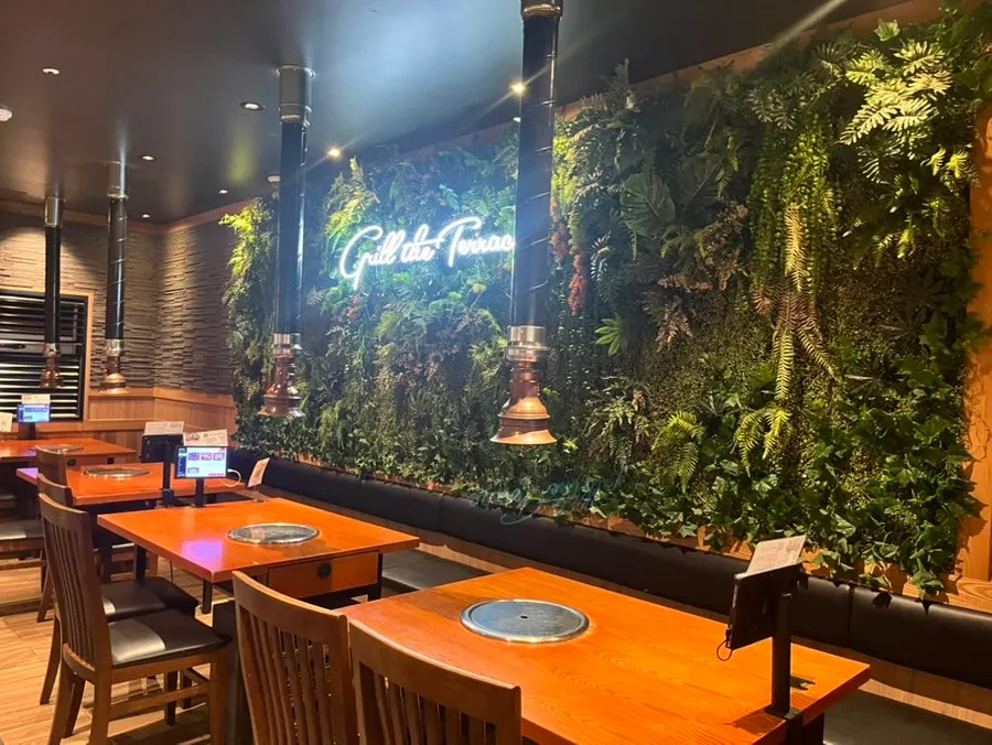 Restaurant interior full of evening diners