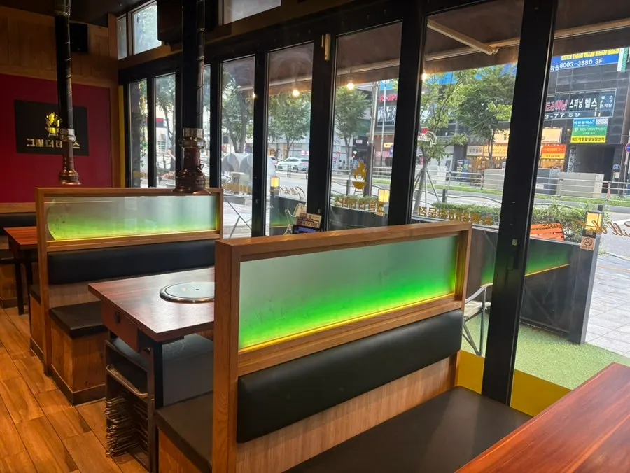 Partitioned table seating inside the Korean BBQ restaurant