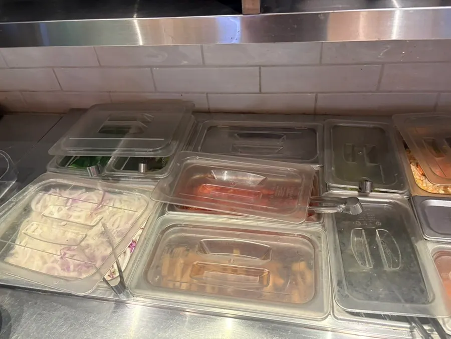 Sauce and lettuce wraps set out for the meat