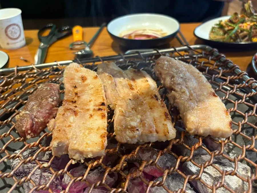 Pork belly placed on the grill