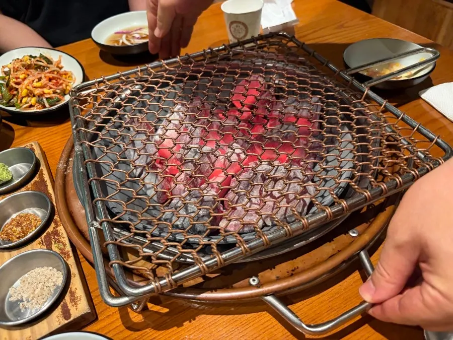 Charcoal grill set up on the table