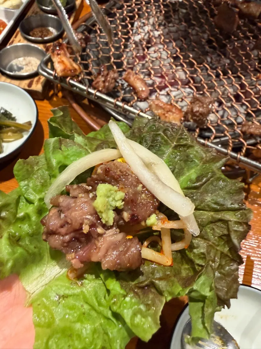 Garlic-marinated pork belly grilled golden over charcoal