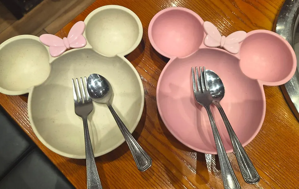 Character-shaped children's dishware and a baby chair