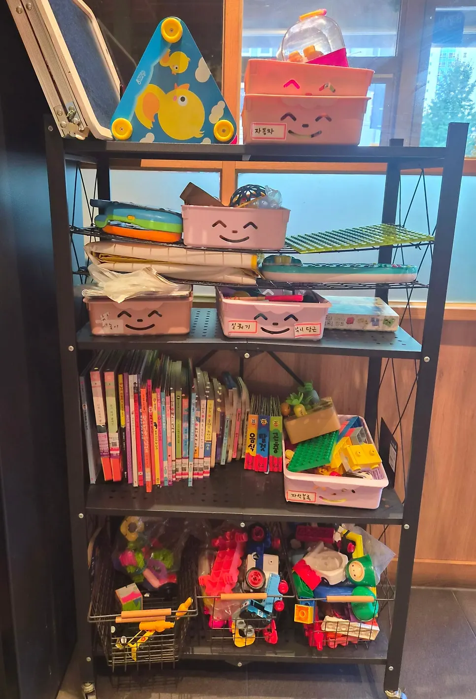 Toy and book corner set up on one side of the store