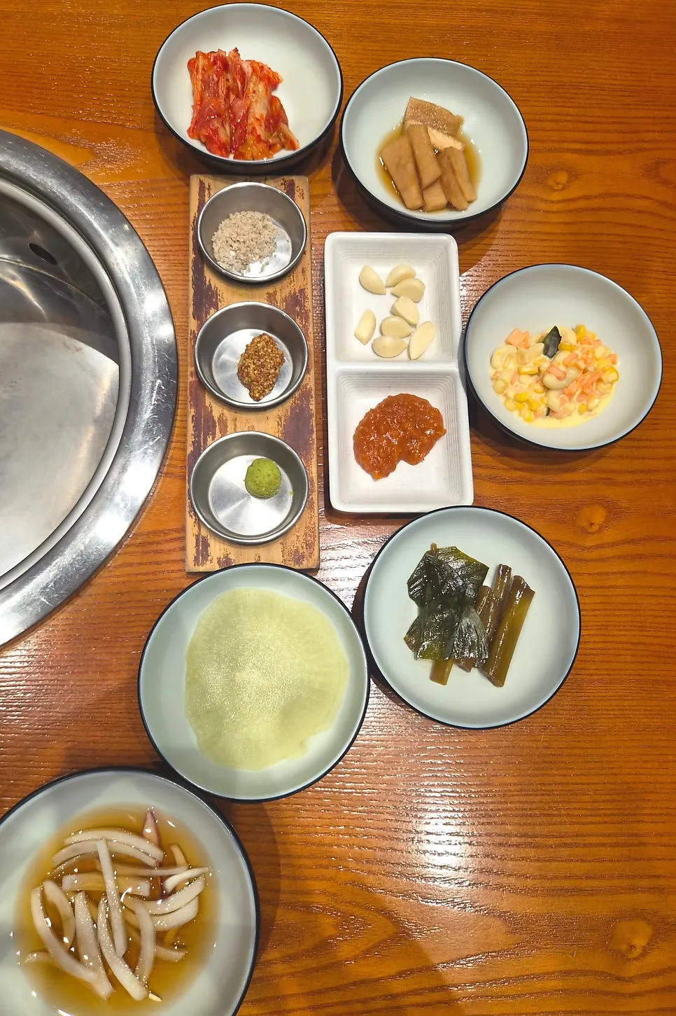 Table set with basic side dishes and sauces