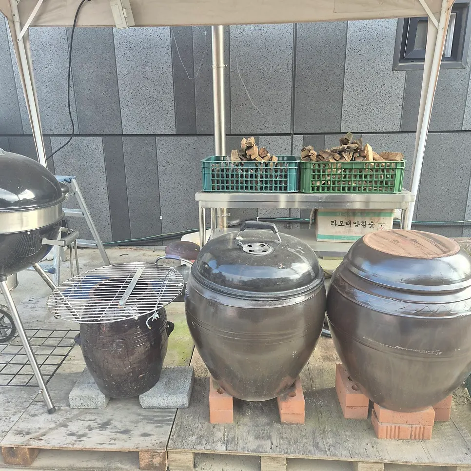 Parking lot behind the restaurant and greenhouse with wrap vegetables