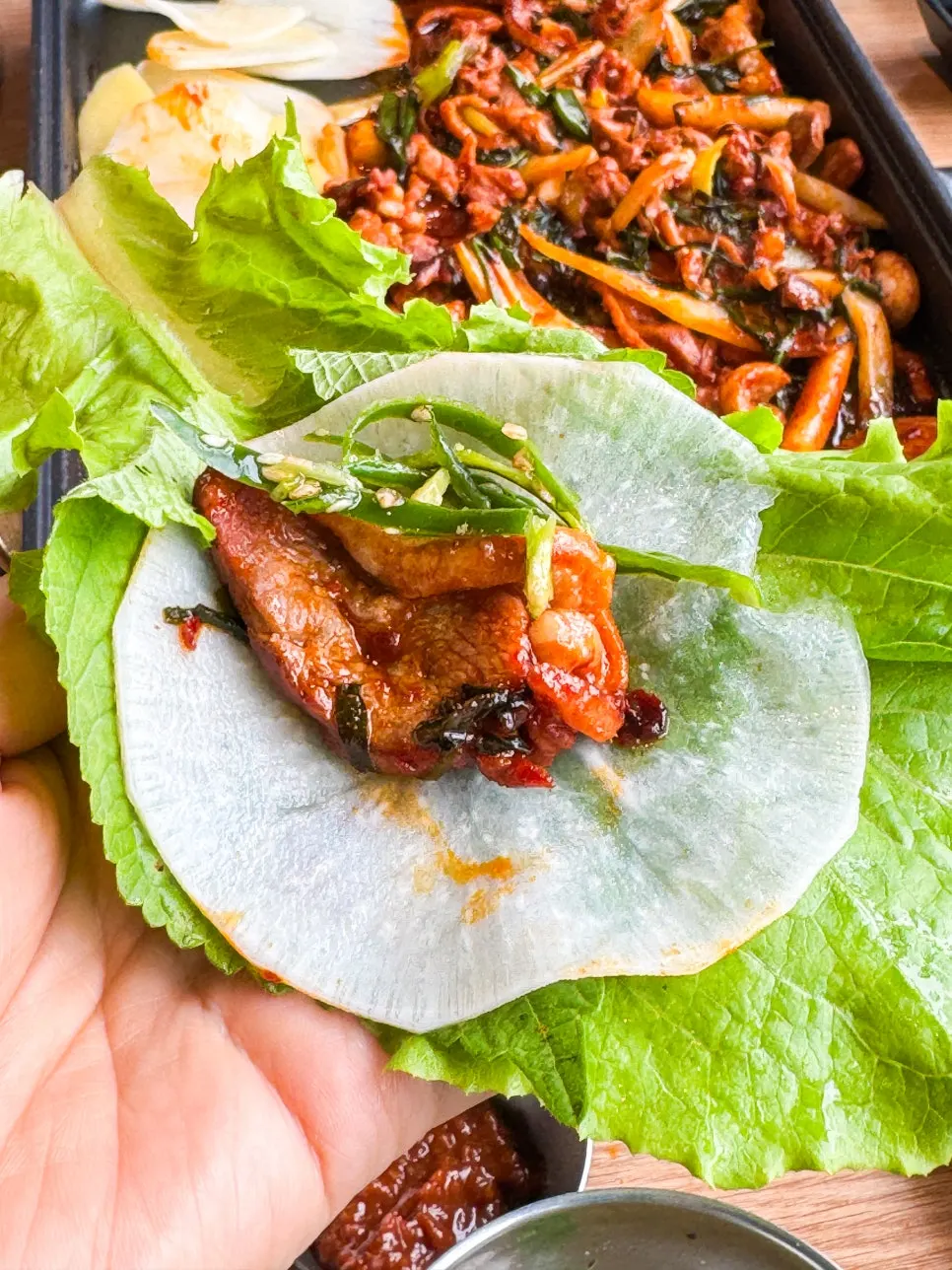 Close-up of red-seasoned marinated duck