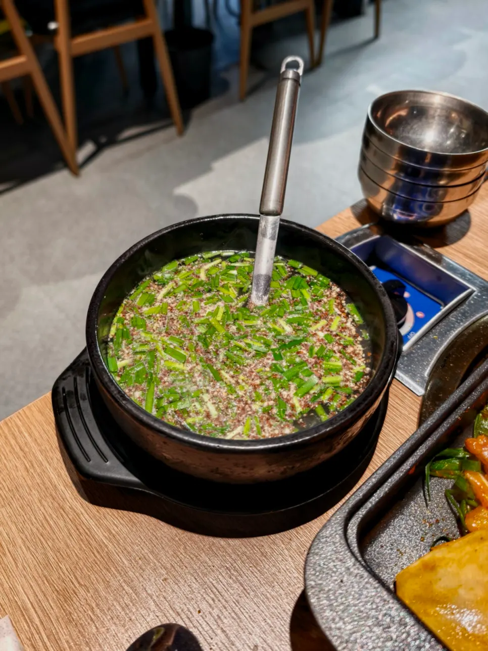Pot of milky duck hotpot served free