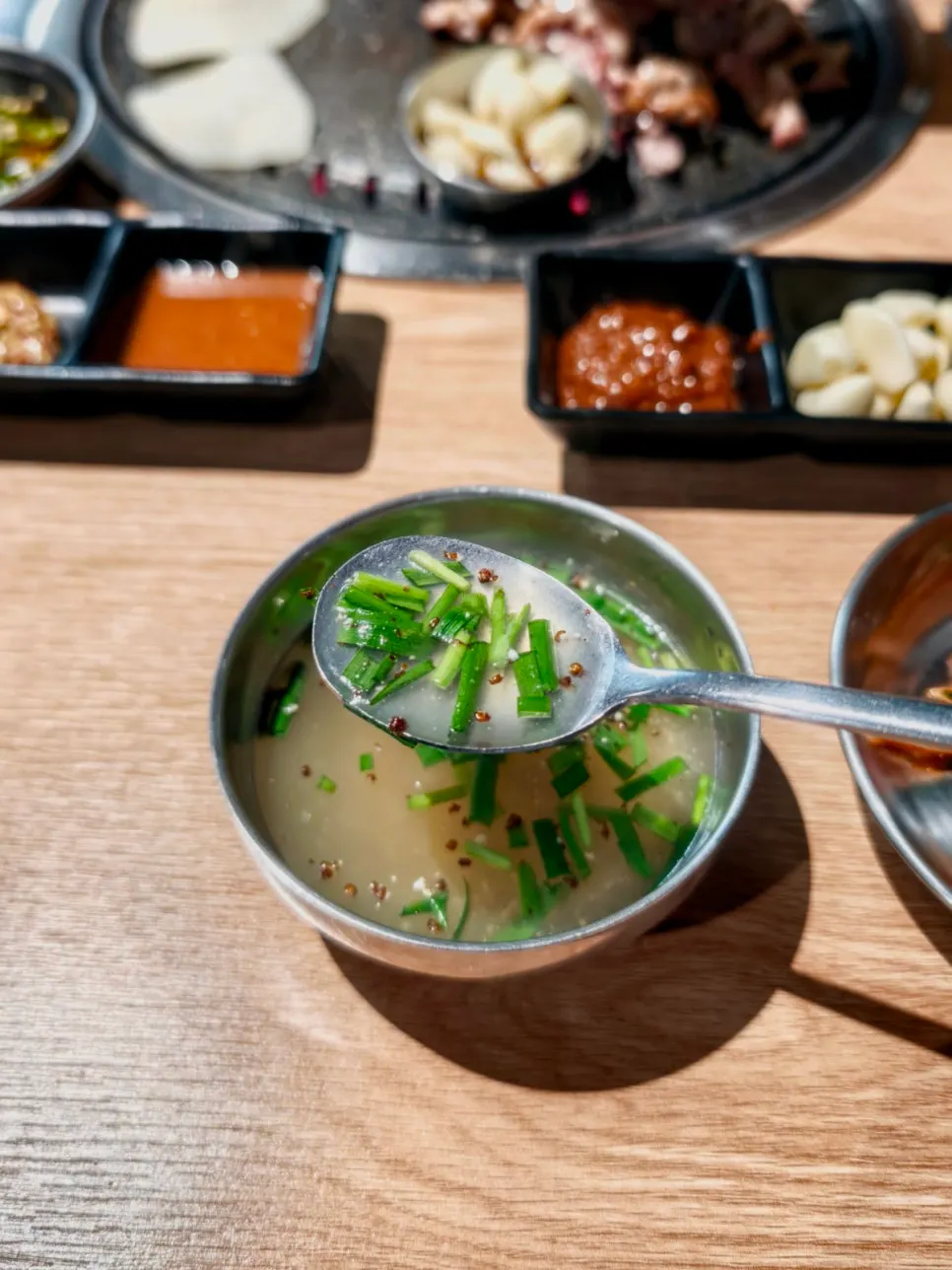 Close-up of duck hotpot ingredients and broth
