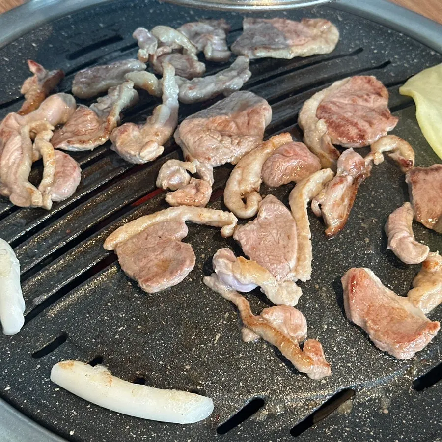 Golden, charcoal-grilled raw duck barbecue