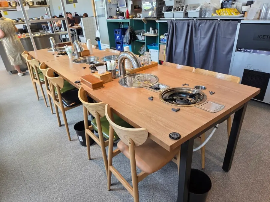 Dining hall seating at Grill Duck Hangari Barbecue