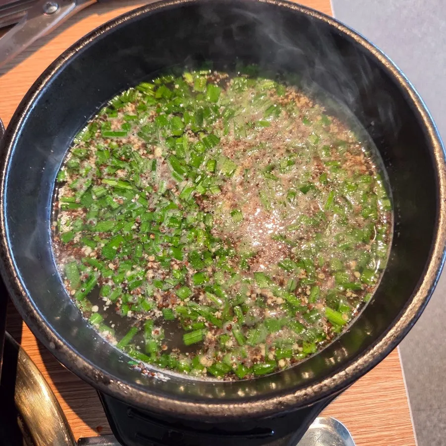 Complimentary duck soup broth