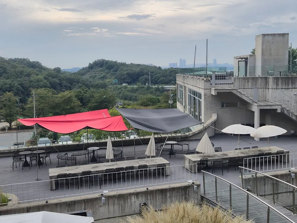 View looking down from the outdoor hill path behind the café