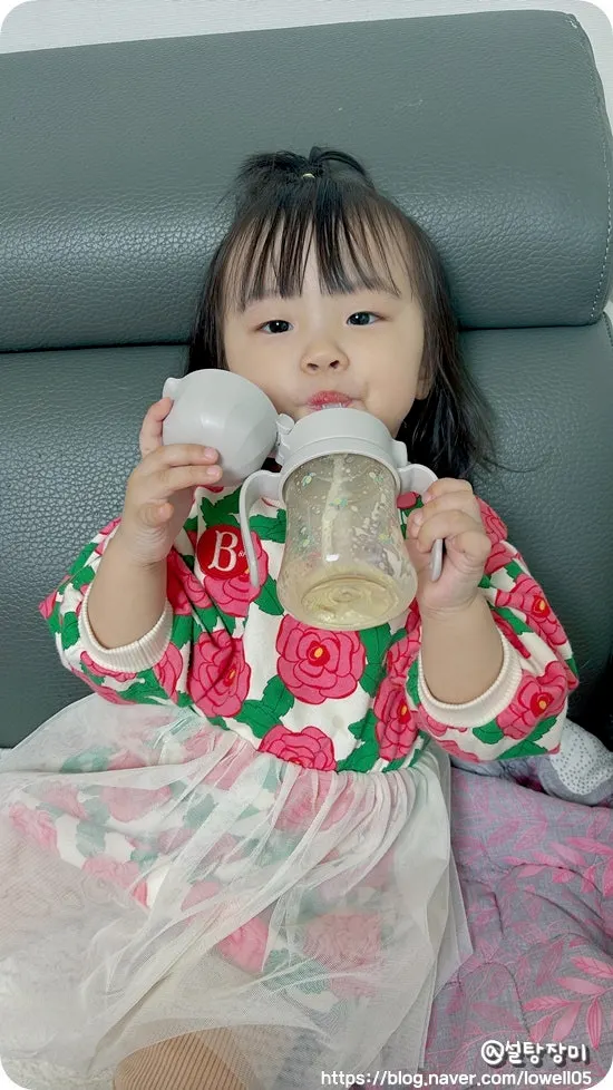 Toddler drinking a snack without resistance