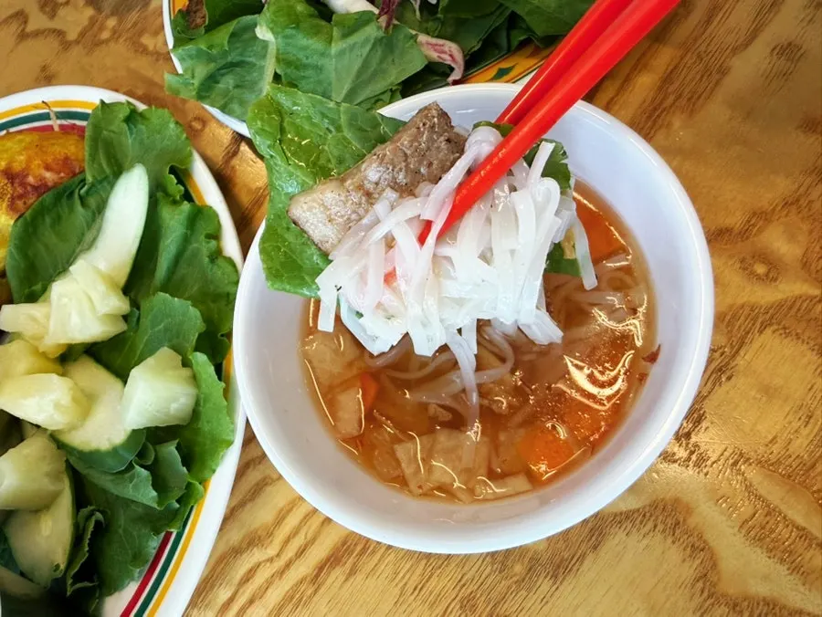 Noodles and vegetables dipped in tangy bun cha sauce