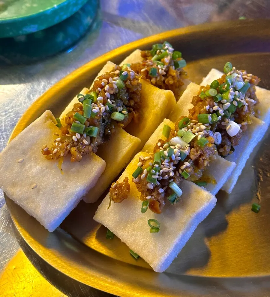 Tofu with meat bites topped on tofu