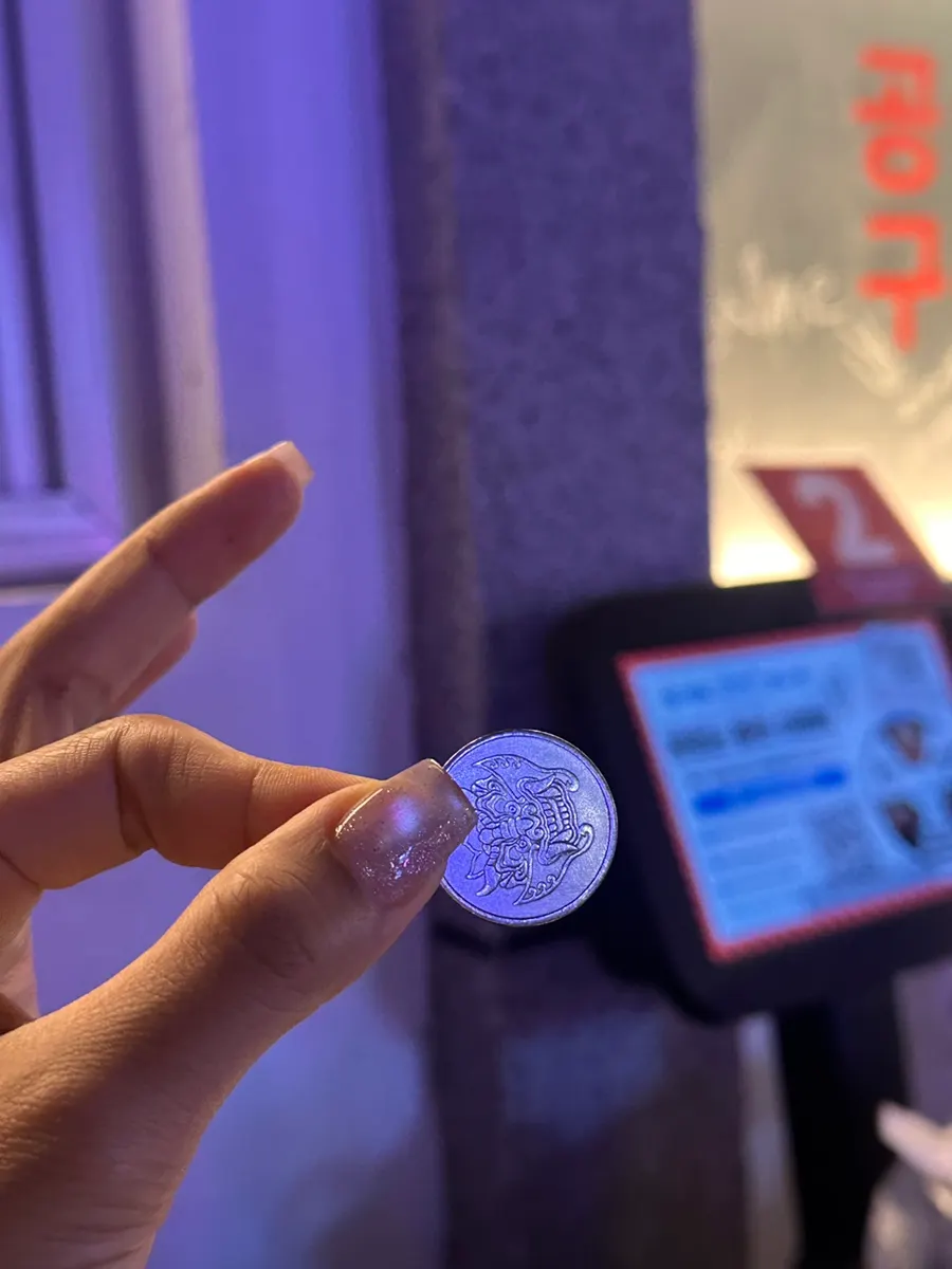 In-store event space usable with coins