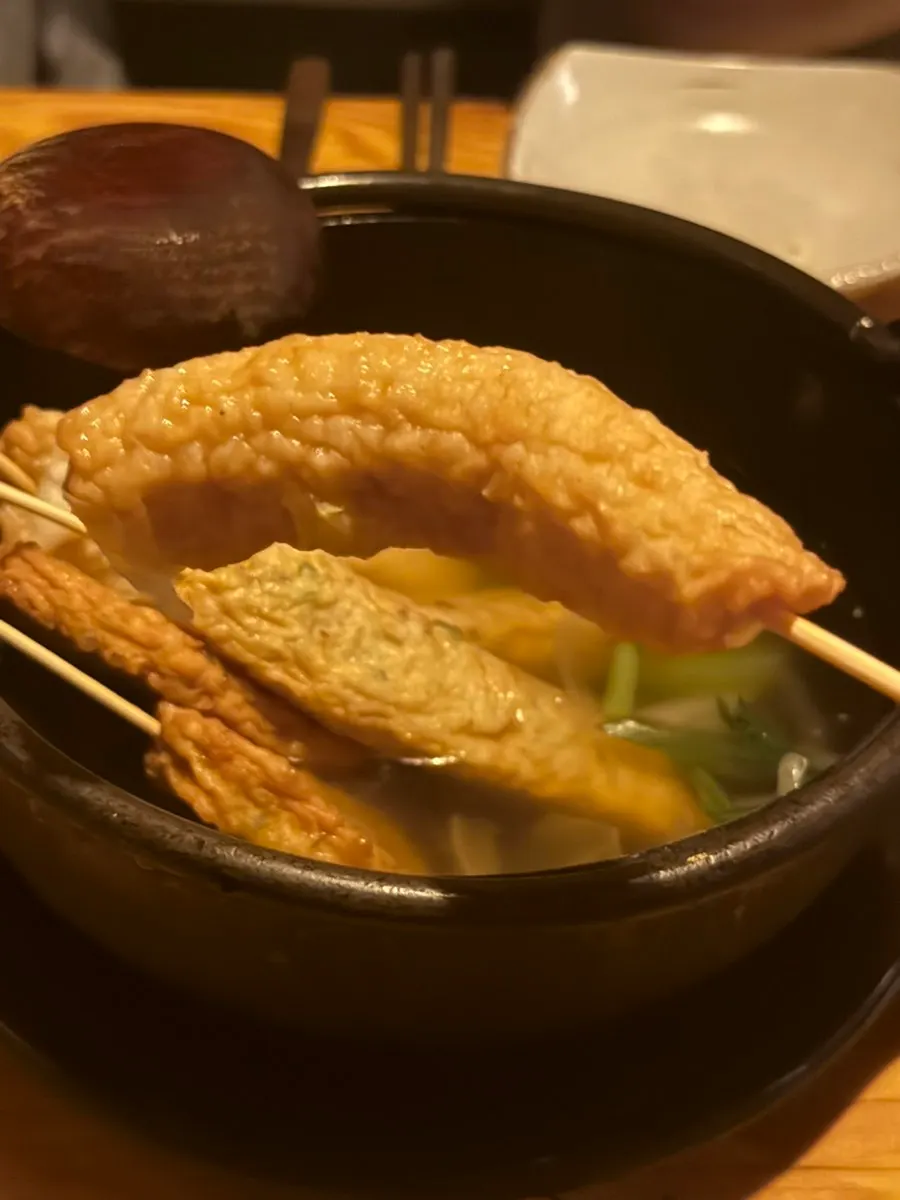Skewered fish cake oden nabe topped with crown daisy greens
