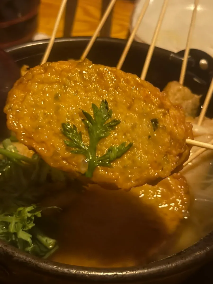 Flat fish cake pulled from the oden nabe
