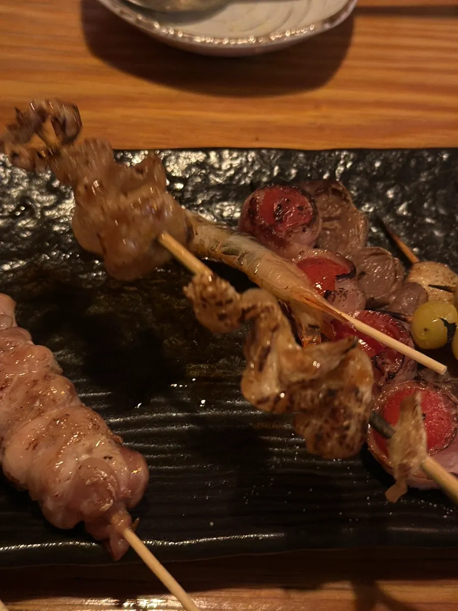 Close-up of a bacon tomato skewer