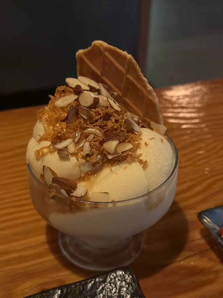 Vanilla cheese ice cream topped with cheese