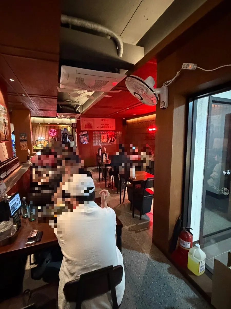 Interior of Monthly Beer Guro branch with spaced-out tables