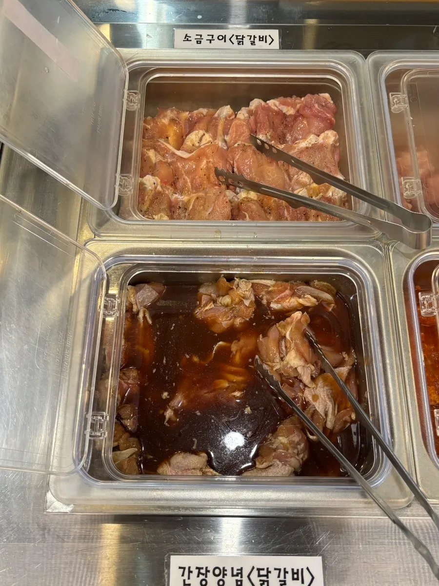 Tray of raw pork belly at the self-bar