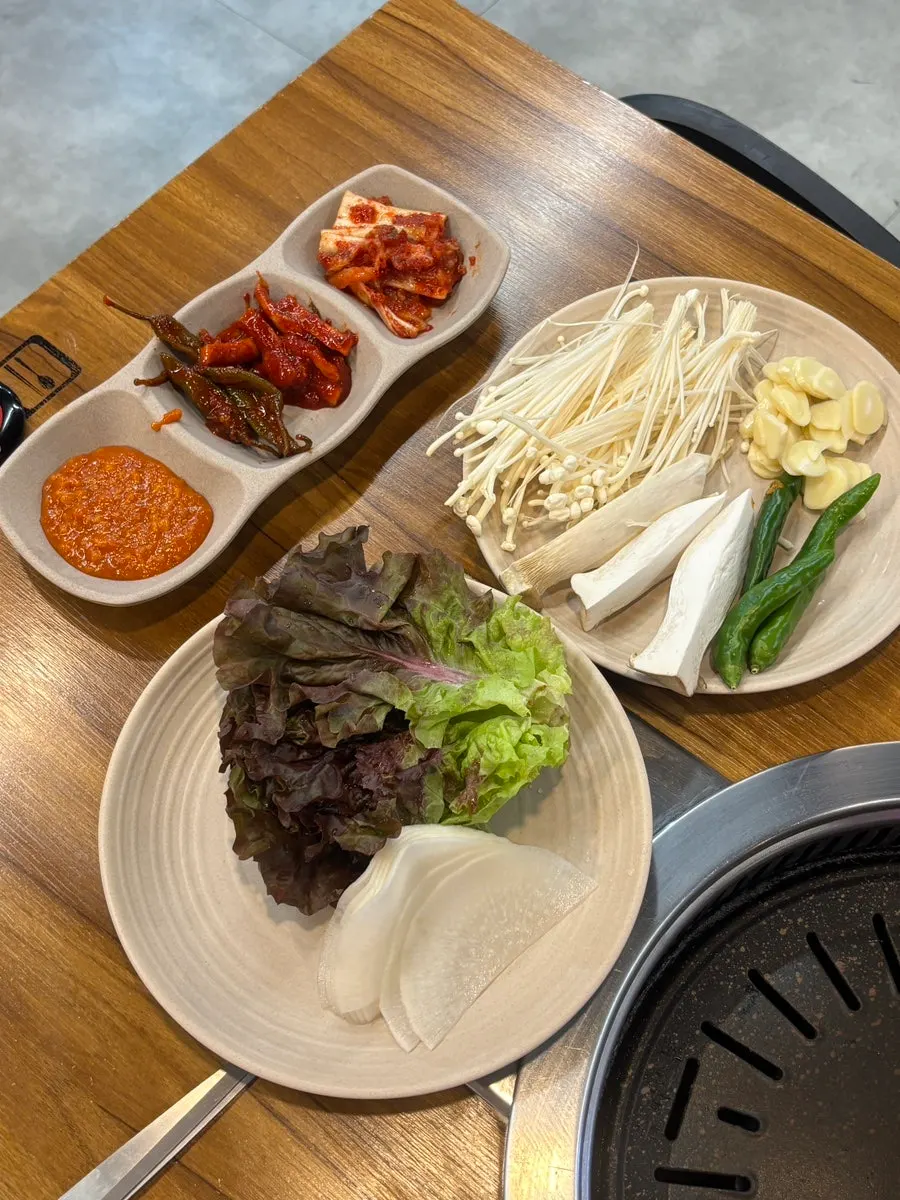 Plate of basic vegetables brought to the table