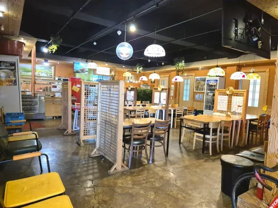Wood-toned interior of Bonghwa Saenggogi Bonjeom