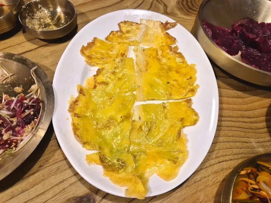 Crispy cabbage pancake served as a side