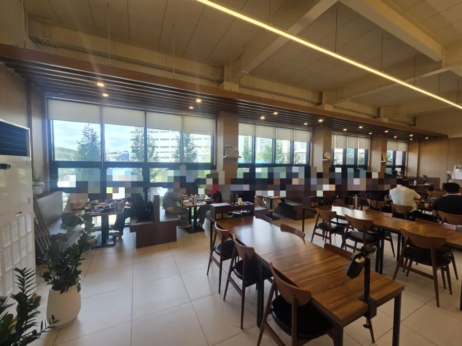 Neatly arranged interior of Guigo's dining hall
