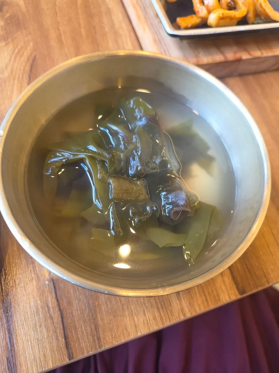 Flaked fish flesh picked out with chopsticks