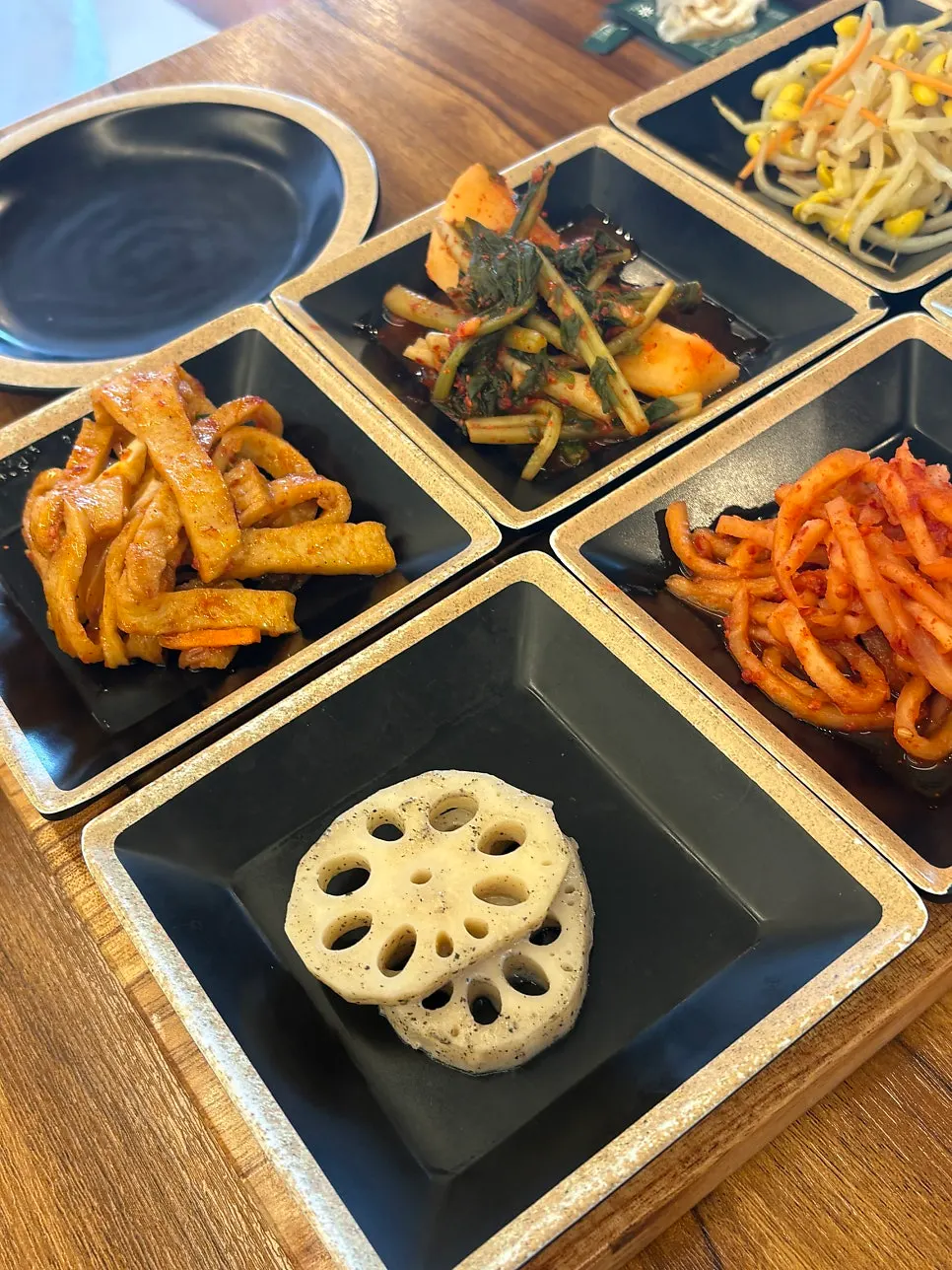Cabbage salad and additional side dish plate