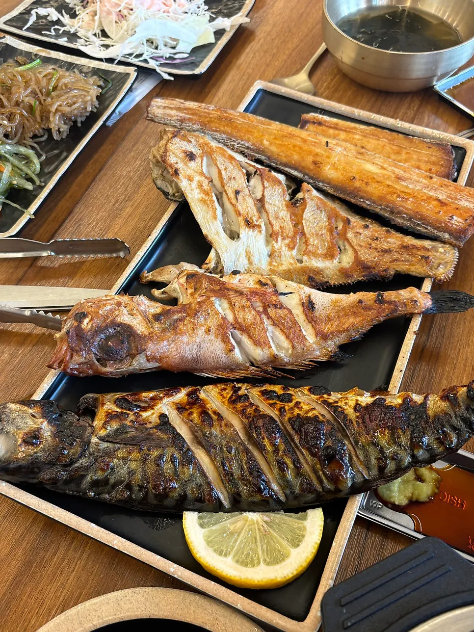 Freshly grilled fish plate straight from the fire oven