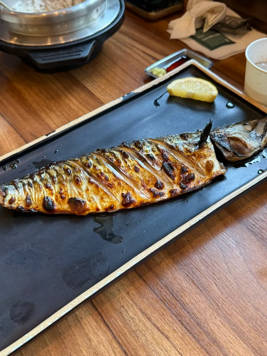 Glistening wood-fired grilled mackerel at Guigo