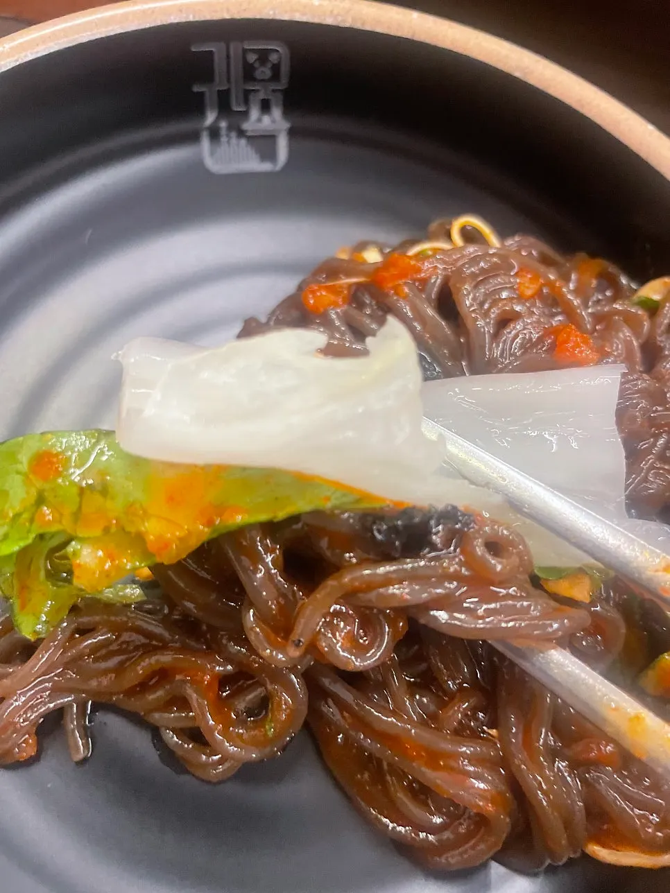 A bite combining jokbal and makguksu