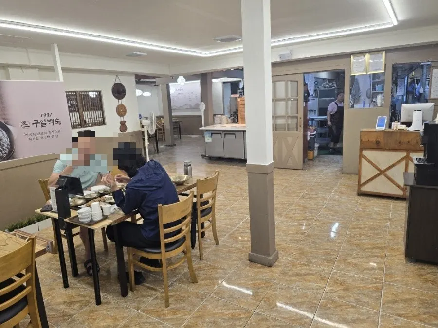 Wood-toned interior of the Guil Baeksuk dining room