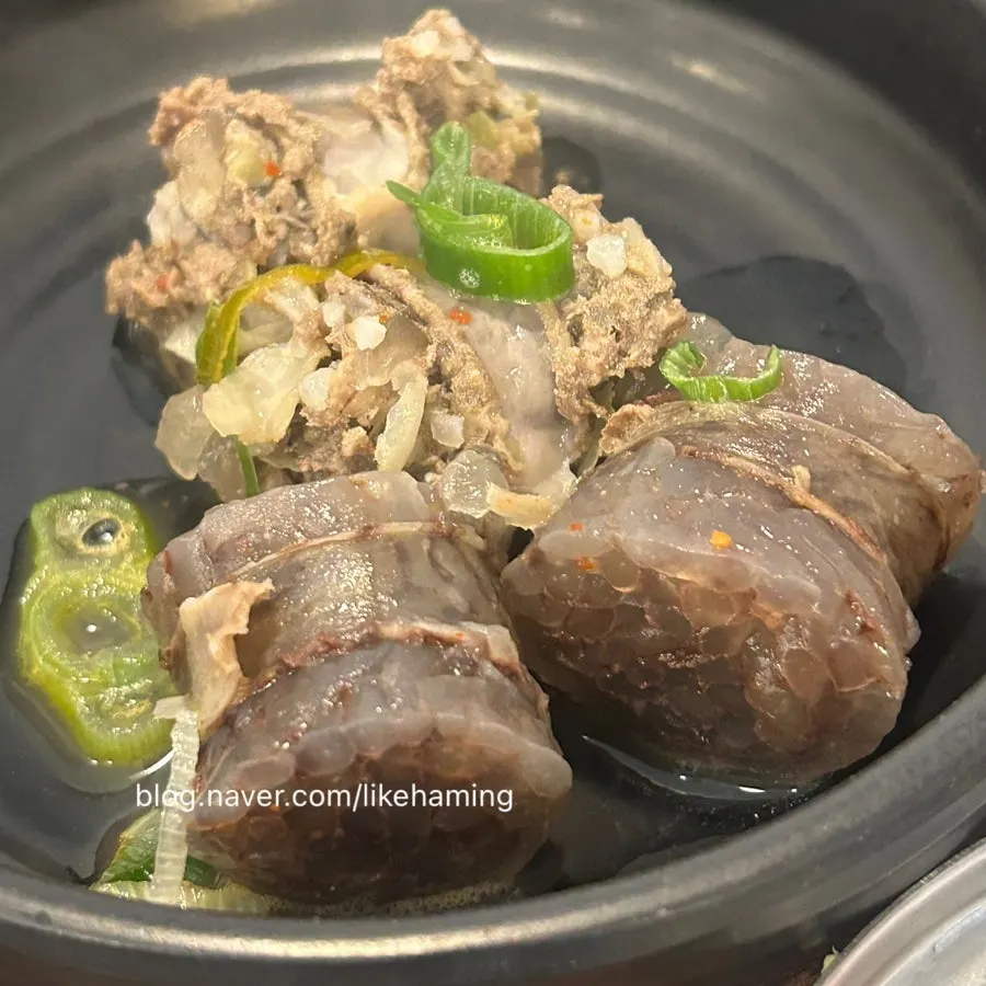 Meat and sundae ingredients inside the sundae gukbap