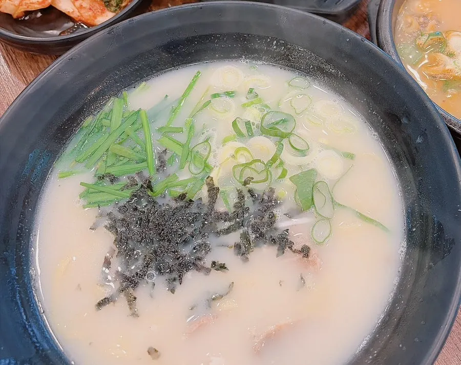A bowl of gogi guksu with warm broth