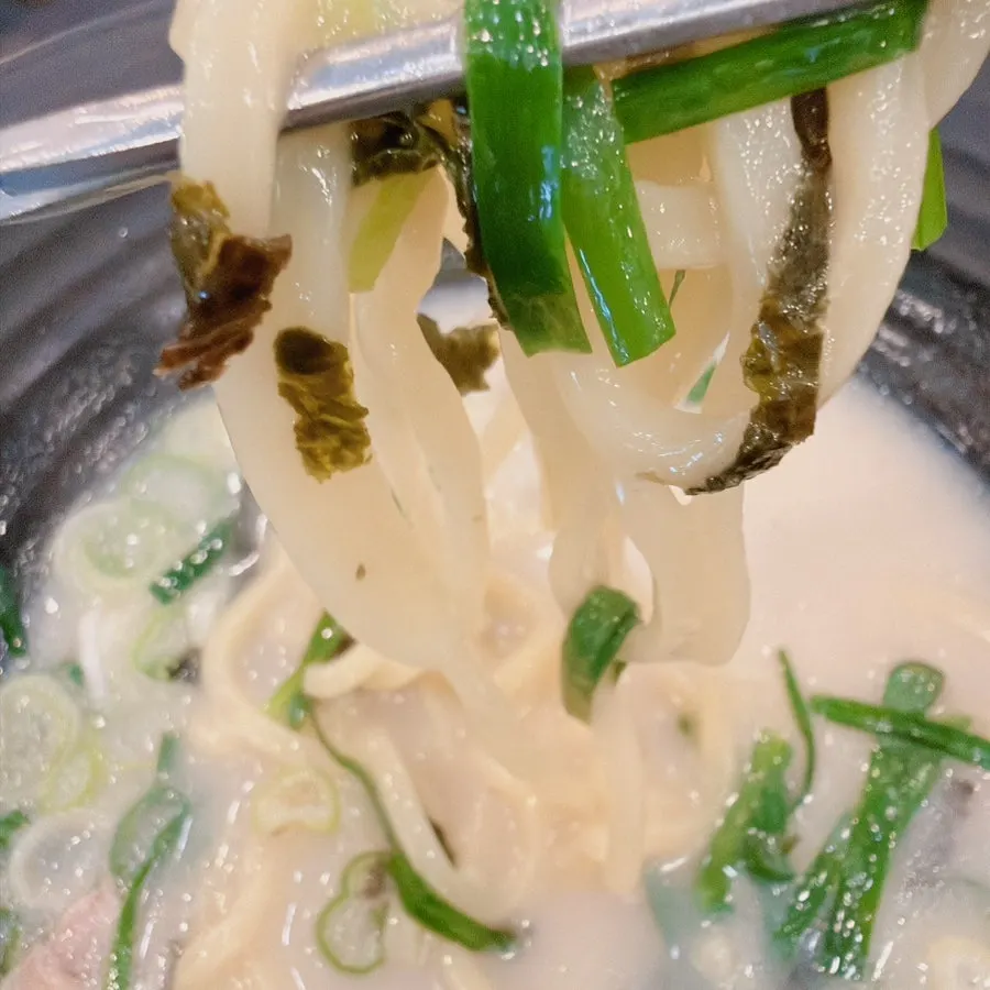Close-up of gogi guksu noodles topped with meat