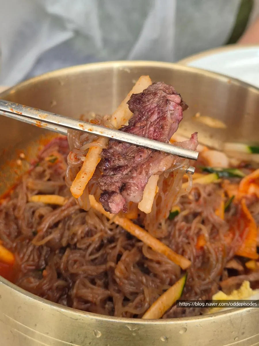 Bibim naengmyeon mixed with the broth