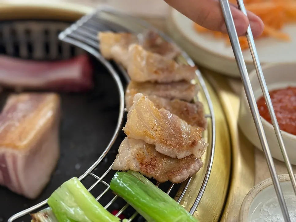 Cooked fresh ribs cut and served by staff