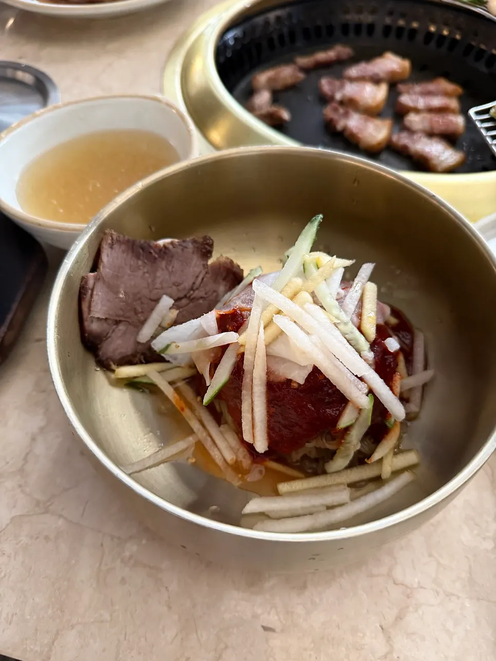 Kkotgetang mixed with stone-pot rice stirred in