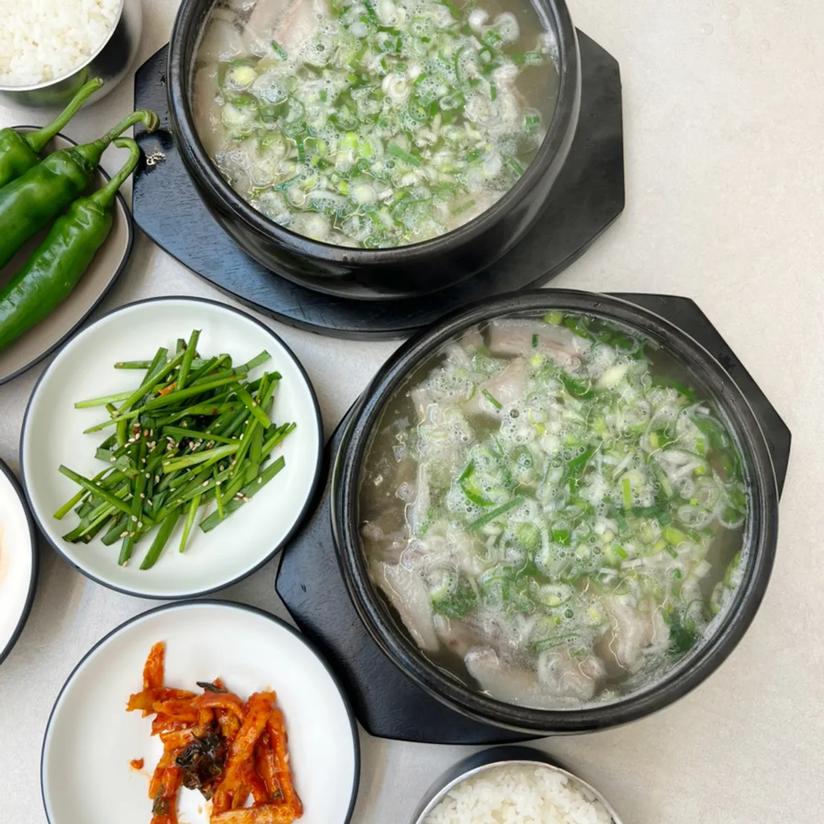 Bowl of special sundaeguk topped with plenty of green onion