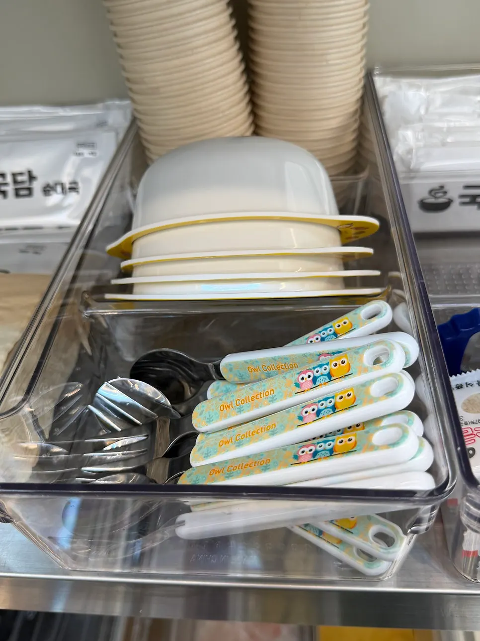Station with baby dishes and utensils