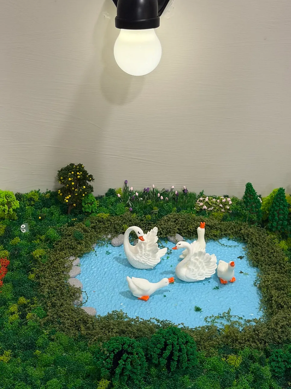 Duck family decoration in front of the restroom