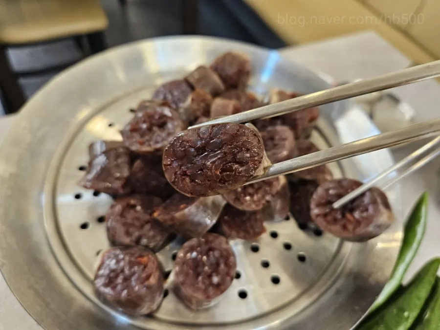 Jjal sundae showing glass noodles and blood filling